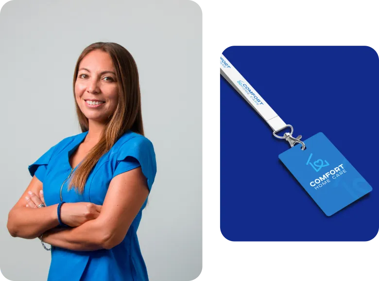Professional Comfort Home Care caregiver in blue scrubs beside a branded employee ID badge