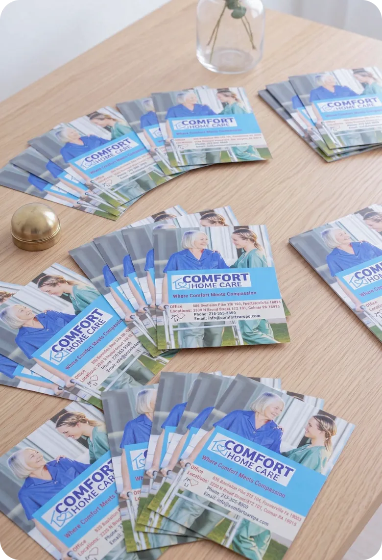 Comfort Home Care brochures arranged on a table for community outreach and home care information